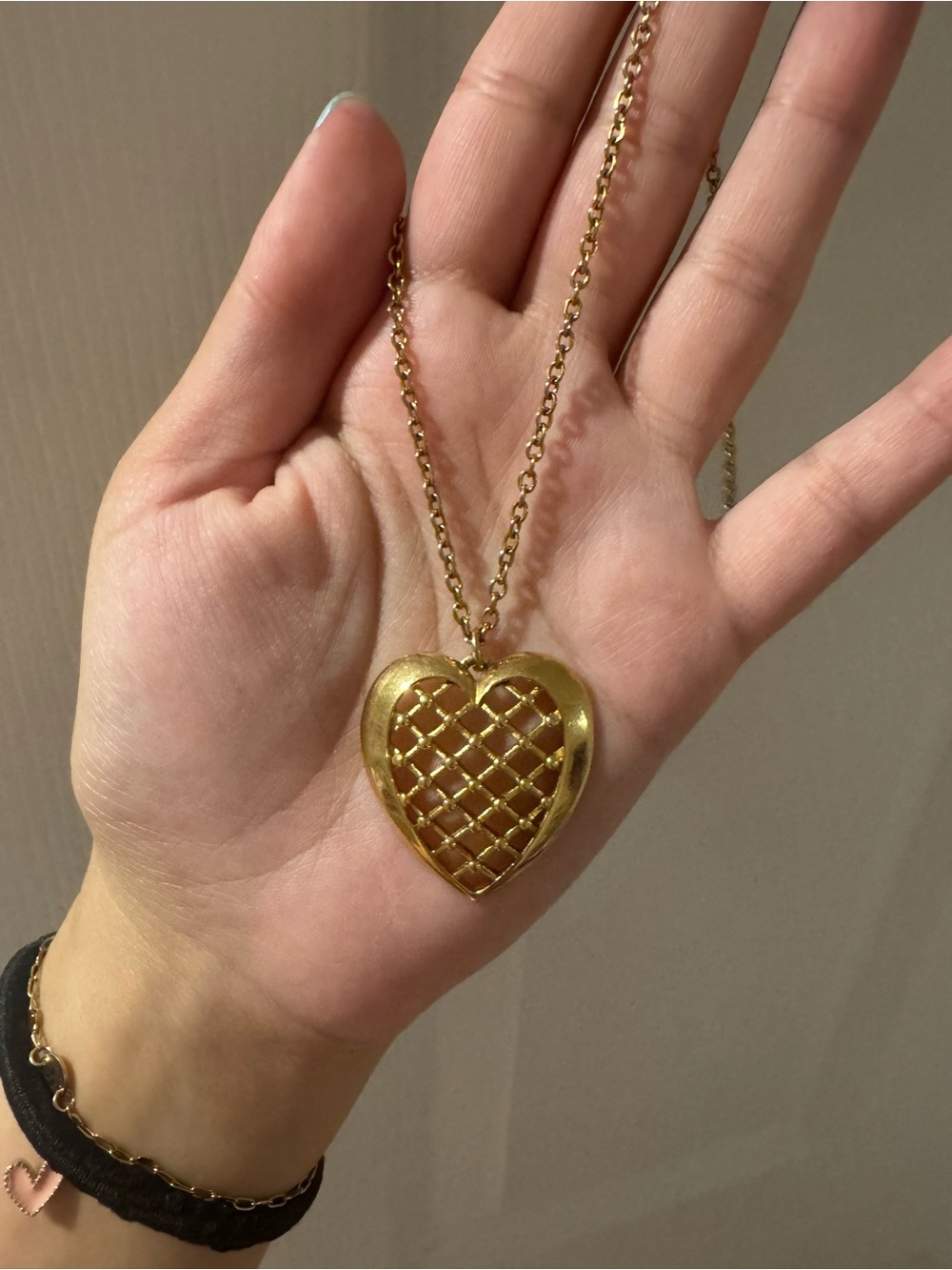 Vintage trifari open weave gold heart necklace